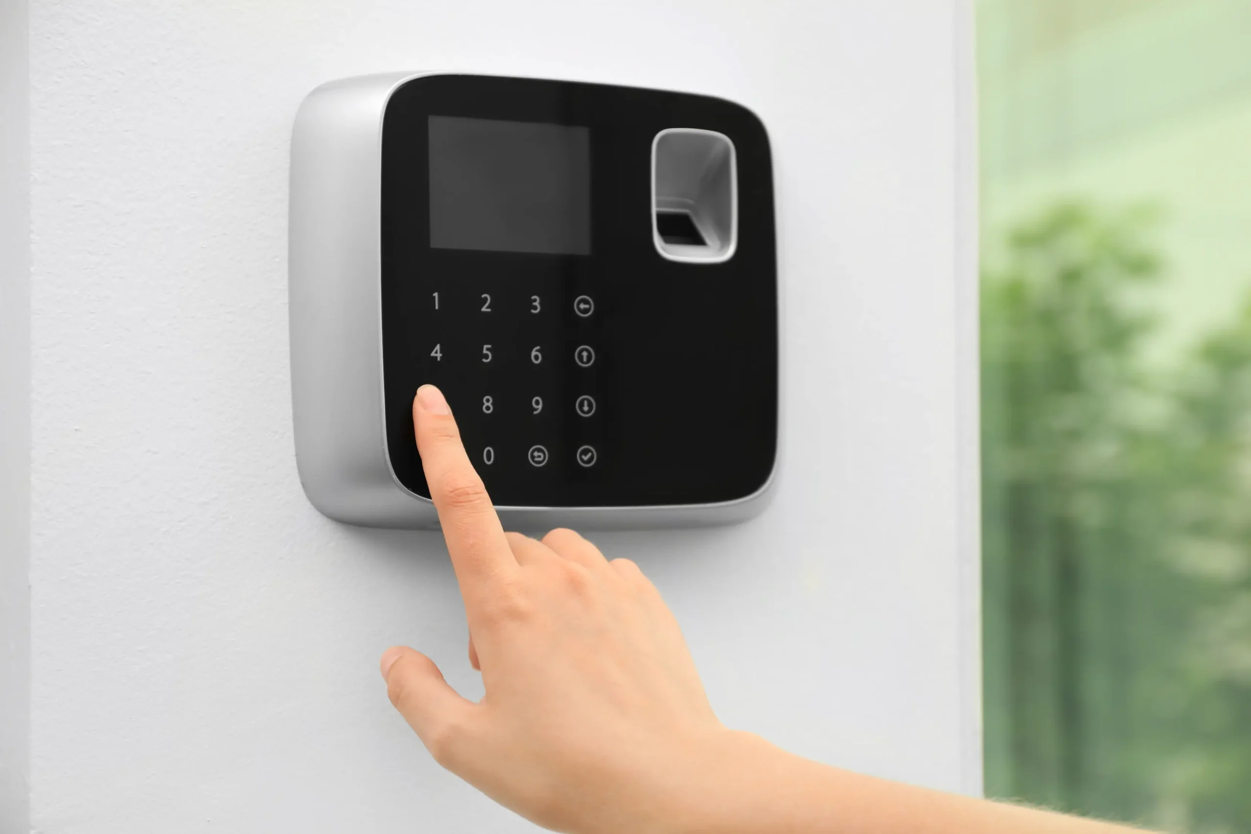 Homeowner Setting A Burglar Alarm In Newcastle